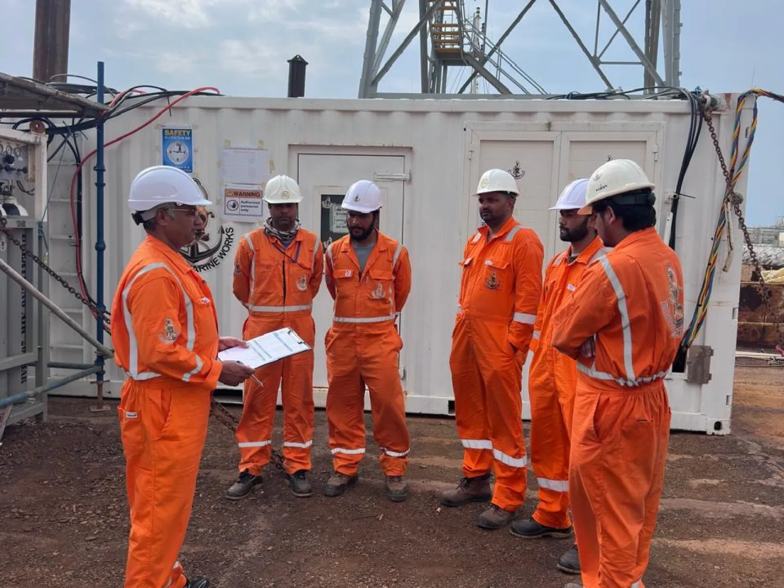 Blue Core Marine Works team conducting a site safety briefing
